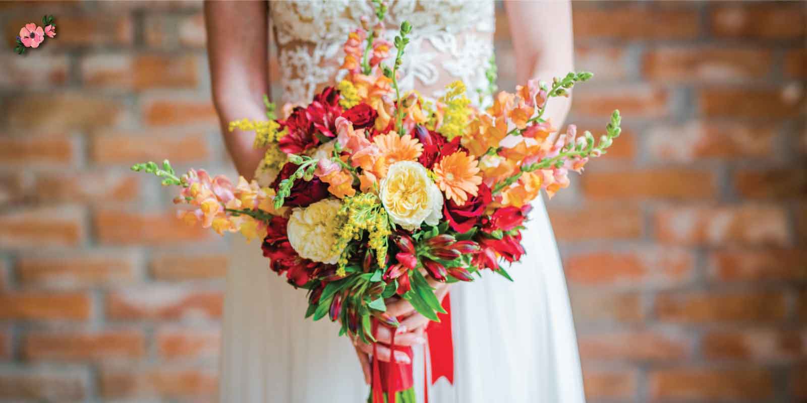 Matrimonio Rosso_Bouquet Bouquet da sposa dai colori caldi, rosso, giallo, arancione