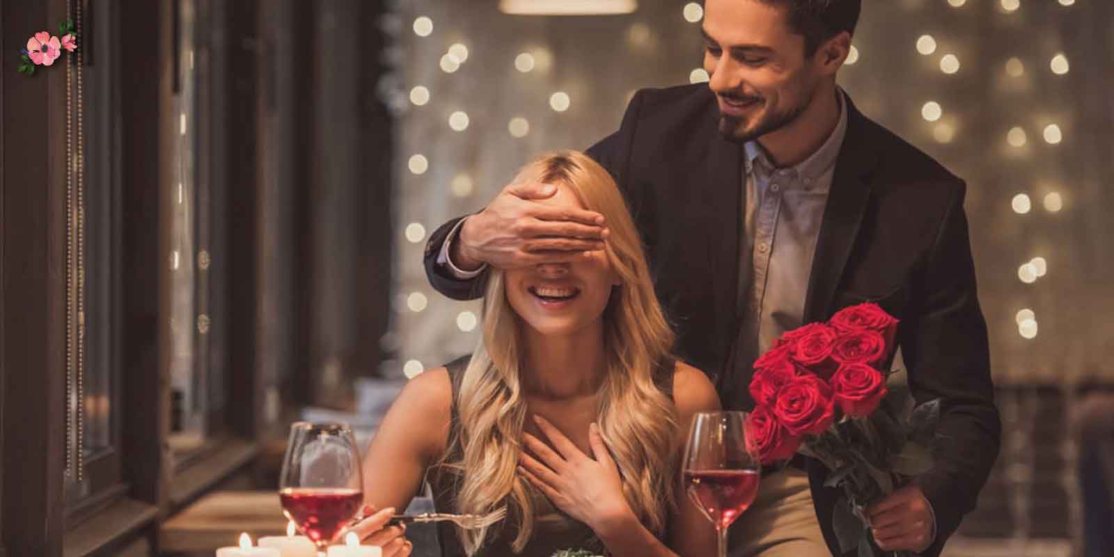 Idee last minute per san valentino_MclA Innamorati ad una cena romantica, lui con un mazzo di rose rosse